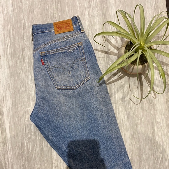 Levi’s 501 distressed jeans